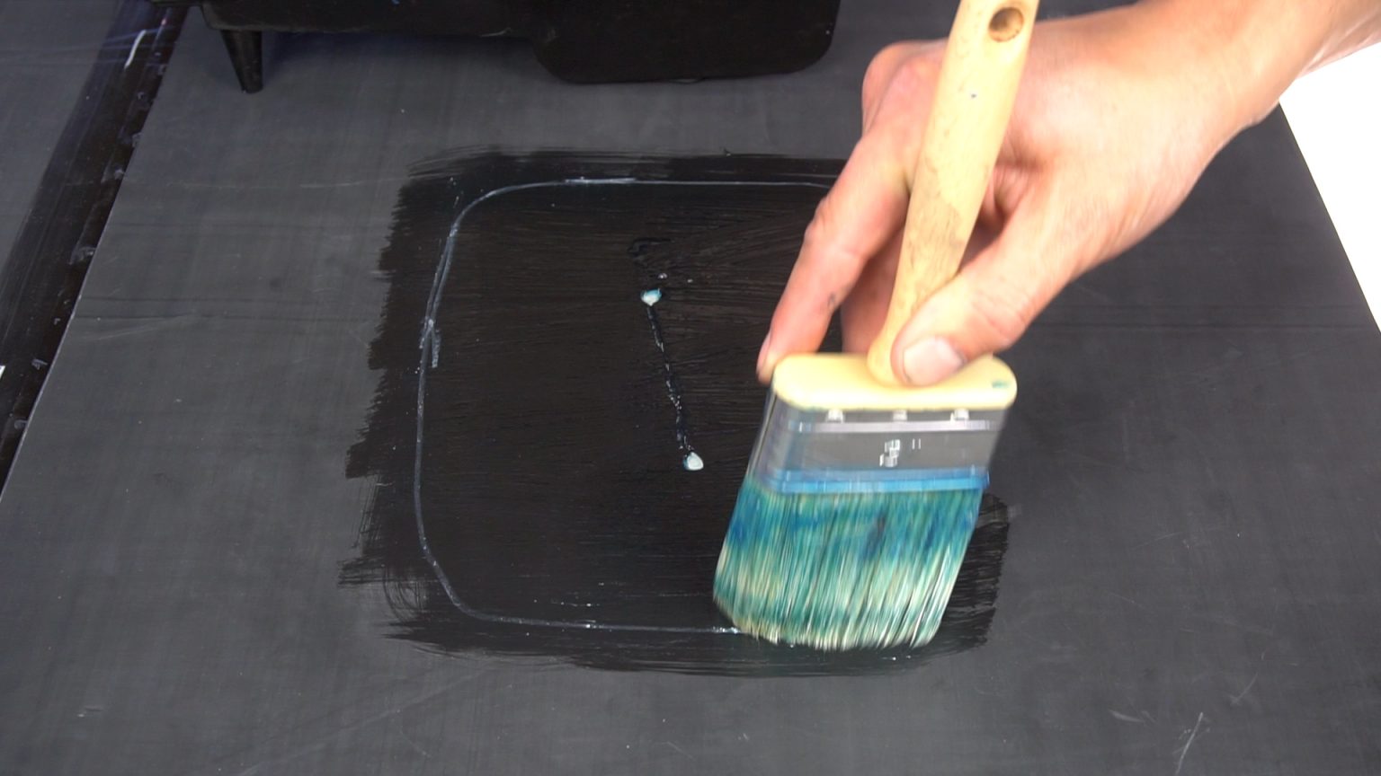 EPDM ONE Primer being applied to an EPDM membrane joint
